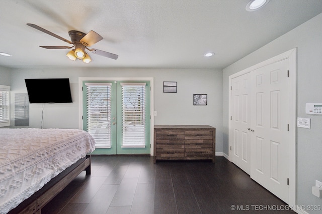 bedroom with ceiling fan, dark wood finished floors, recessed lighting, french doors, and access to exterior