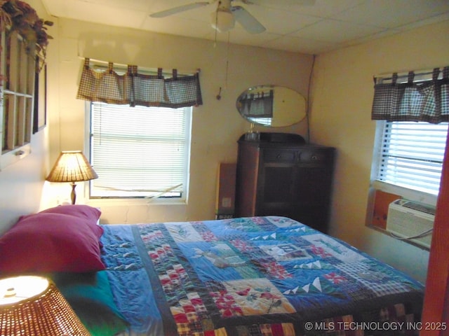 bedroom featuring ceiling fan