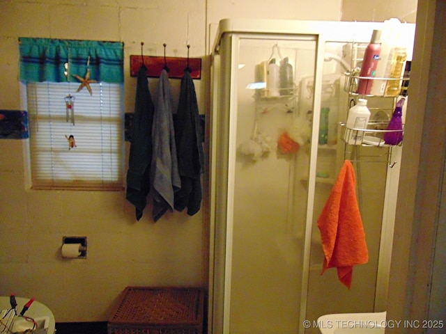 bathroom featuring a stall shower