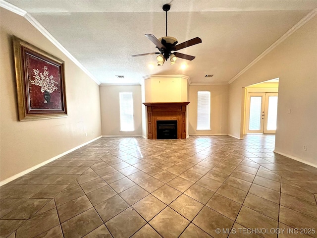 unfurnished living room featuring baseboards, ceiling fan, ornamental molding, french doors, and a fireplace