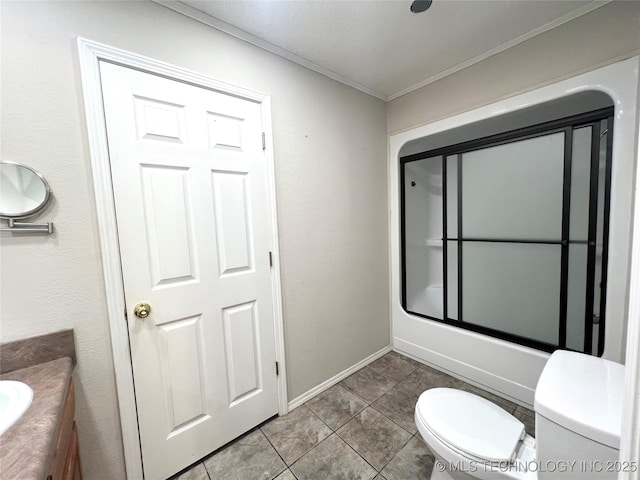 full bathroom with crown molding, baseboards, toilet, tile patterned floors, and vanity