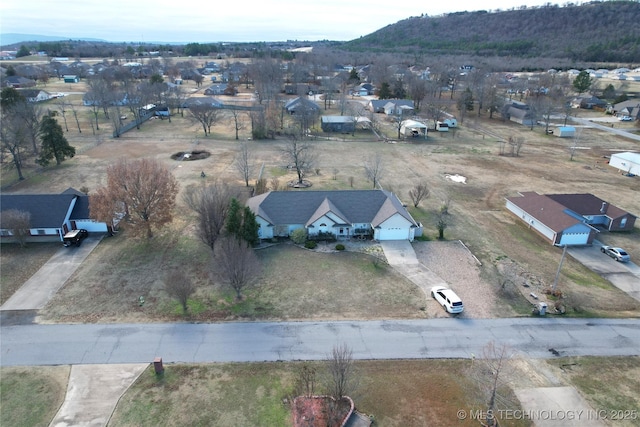 bird's eye view featuring a mountain view and a residential view