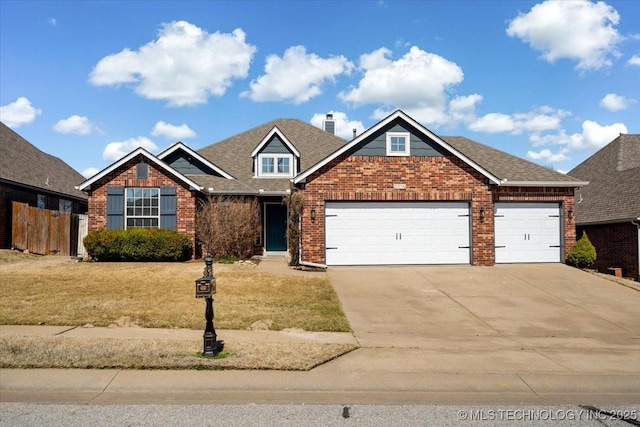 view of front of house with fence, an attached garage, a chimney, concrete driveway, and brick siding