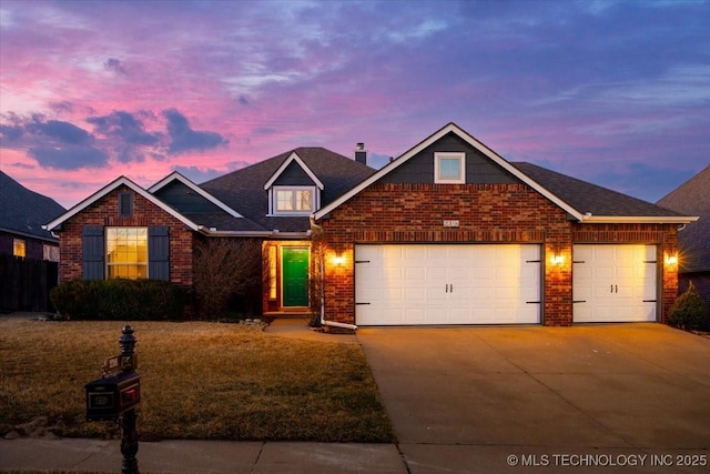 view of front facade featuring brick siding, roof with shingles, concrete driveway, and an attached garage