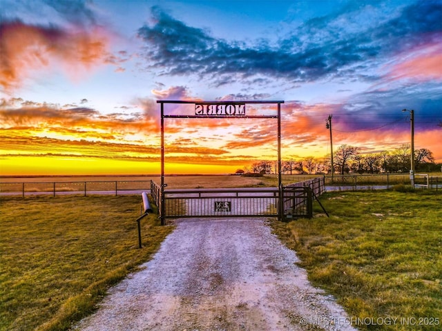 exterior space featuring a gate and a gated entry