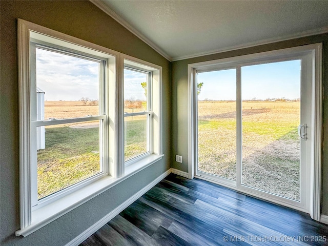 unfurnished sunroom featuring vaulted ceiling