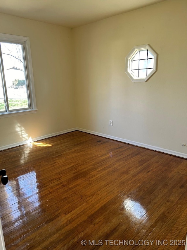 339 W 62nd St N, Tulsa, OK 74126 - empty room with baseboards and hardwood / wood-style floors