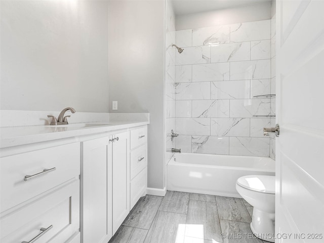 full bathroom with shower / bath combination, toilet, and vanity