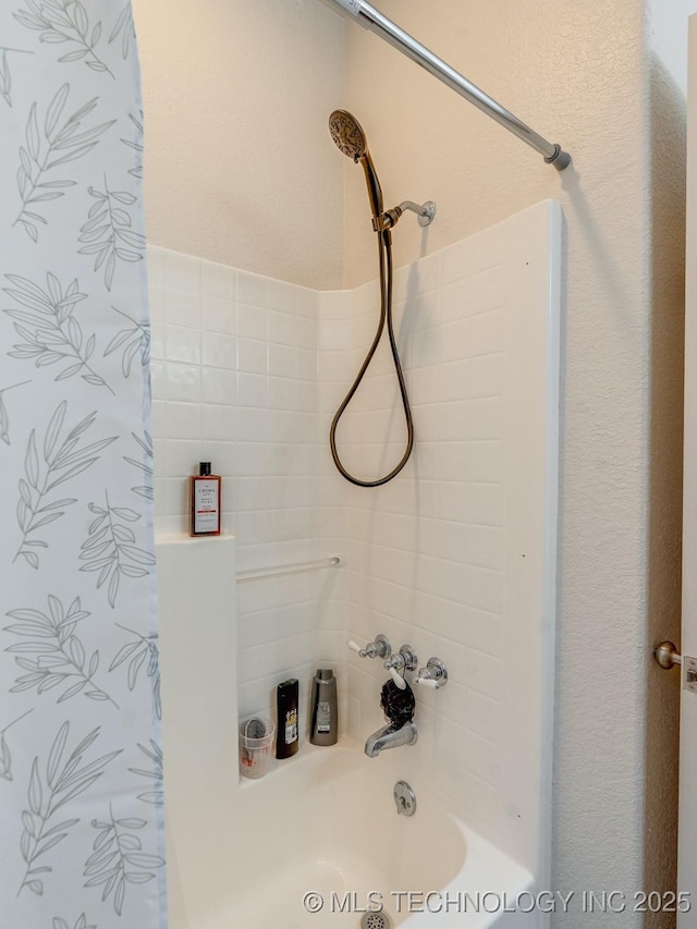 full bathroom with shower / tub combination