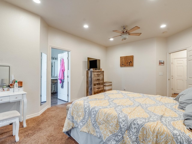 carpeted bedroom featuring recessed lighting, a ceiling fan, ensuite bathroom, and baseboards