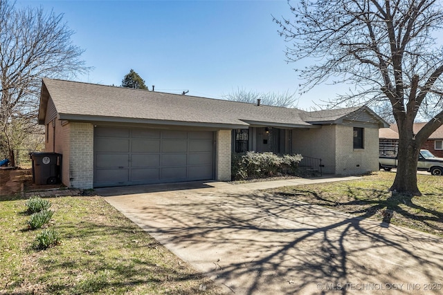 ranch-style home featuring driveway, brick siding, an attached garage, and a shingled roof