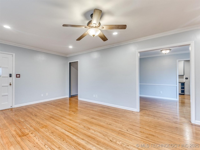 unfurnished room featuring a ceiling fan, baseboards, recessed lighting, ornamental molding, and light wood-style floors