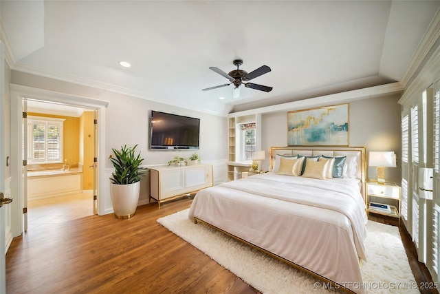 bedroom featuring recessed lighting, light wood-style floors, ornamental molding, and a ceiling fan