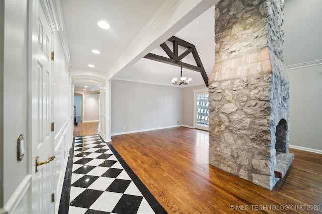 219 E 28th St, Tulsa, OK 74114 - hallway featuring a chandelier, recessed lighting, crown molding, and arched walkways