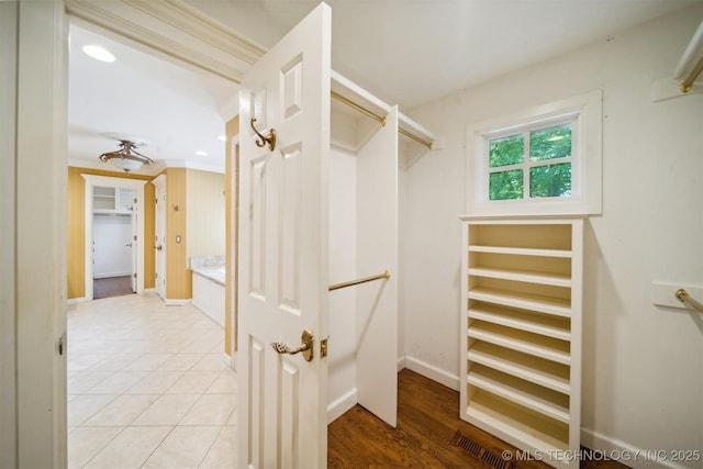 walk in closet featuring light tile patterned floors