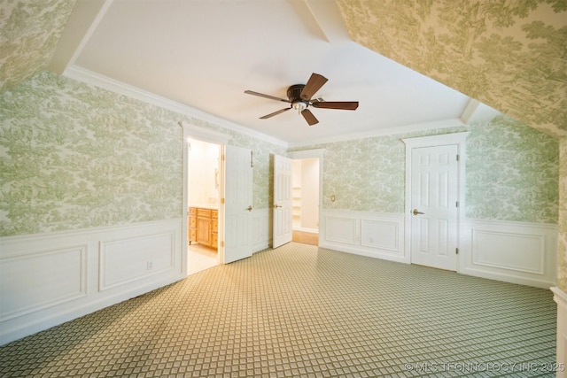 219 E 28th St, Tulsa, OK 74114 - additional living space featuring a ceiling fan, carpet floors, a wainscoted wall, wallpapered walls, and a decorative wall