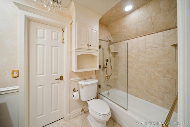 bathroom with tile patterned floors, toilet, and shower / tub combination