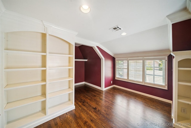 bonus room featuring lofted ceiling, wood finished floors, visible vents, and baseboards