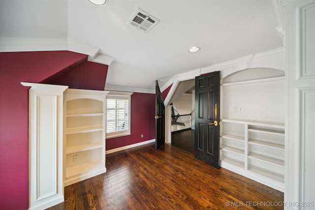 additional living space featuring visible vents, baseboards, stairway, recessed lighting, and wood finished floors