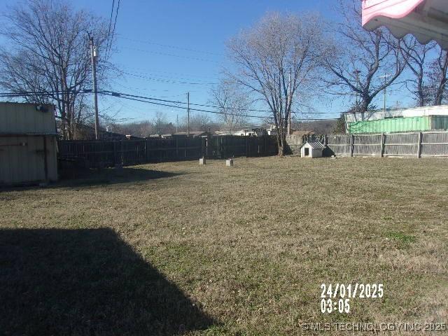 view of yard with fence