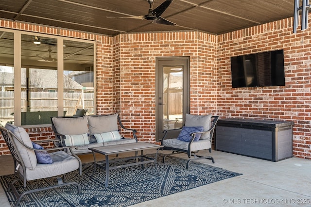 view of patio / terrace featuring outdoor lounge area, a ceiling fan, and fence