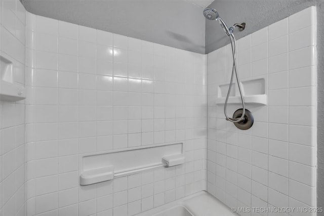 bathroom featuring a shower