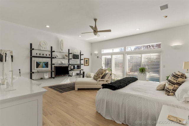 bedroom with visible vents, recessed lighting, light wood-style floors, a ceiling fan, and access to outside