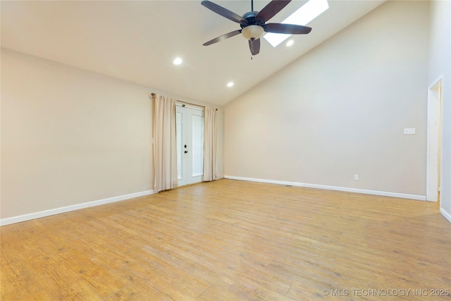 empty room with baseboards, high vaulted ceiling, ceiling fan, and light wood finished floors