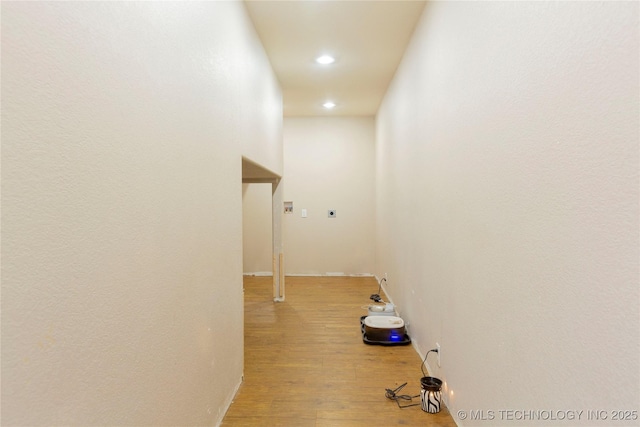 hallway featuring recessed lighting and light wood-type flooring