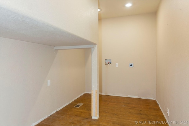 interior space featuring visible vents and wood finished floors