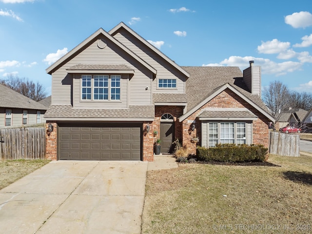 view of front of home with brick siding, driveway, and fence