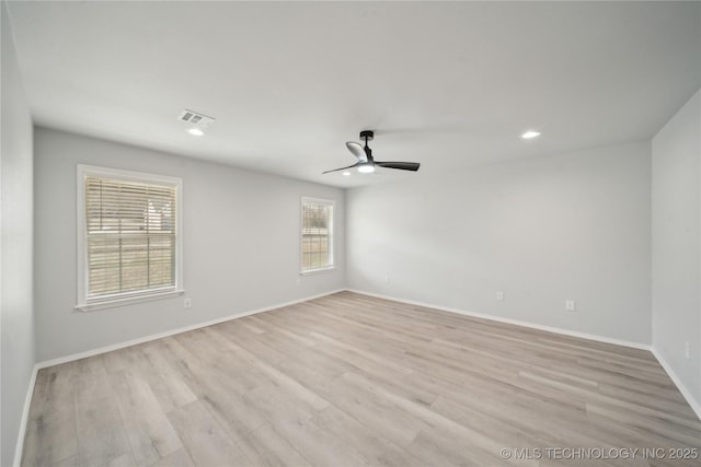 unfurnished room featuring visible vents, a ceiling fan, recessed lighting, light wood finished floors, and baseboards