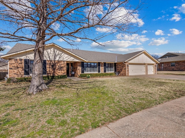 view of front of property featuring concrete driveway, brick siding, a garage, and a front yard