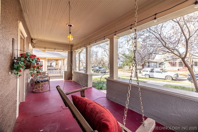 view of patio featuring a porch