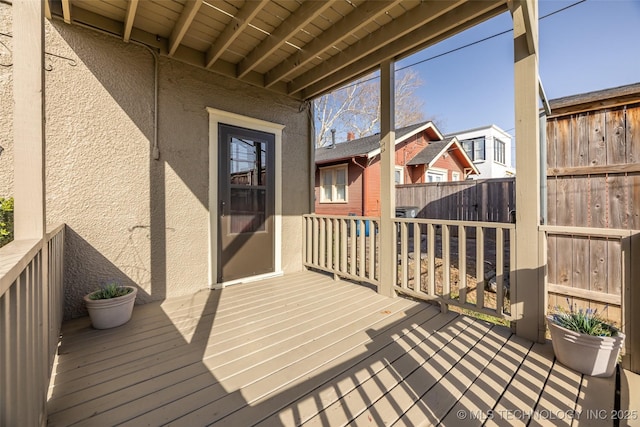 wooden deck featuring fence