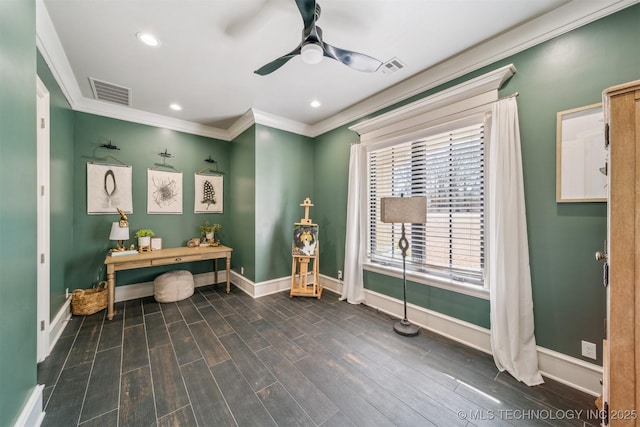 office area featuring visible vents, crown molding, baseboards, and wood finished floors