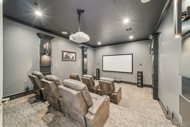 cinema featuring visible vents, recessed lighting, ornate columns, and ornamental molding