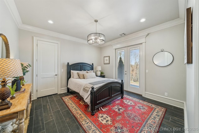 bedroom featuring baseboards, visible vents, wood tiled floor, ornamental molding, and access to outside