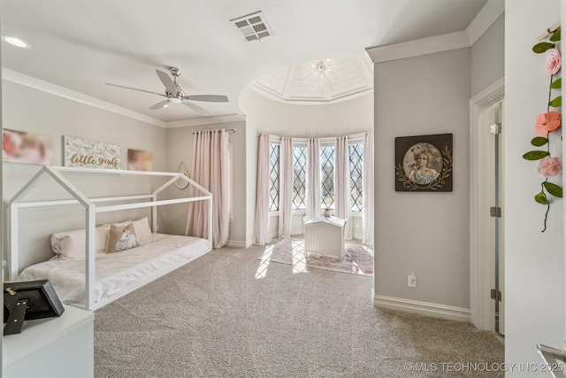 carpeted bedroom featuring visible vents, ceiling fan, crown molding, and baseboards