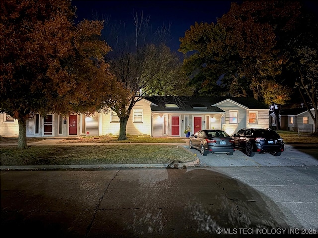 view of front of home with a yard