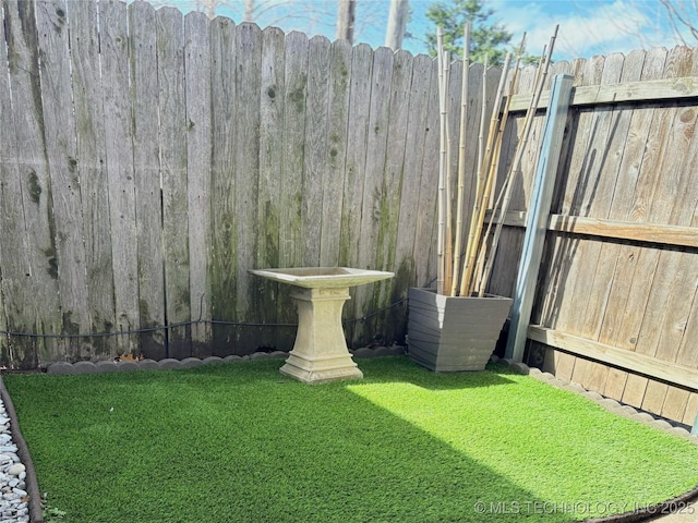 view of yard featuring fence