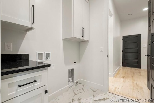 clothes washing area with marble finish floor, washer hookup, cabinet space, baseboards, and hookup for an electric dryer