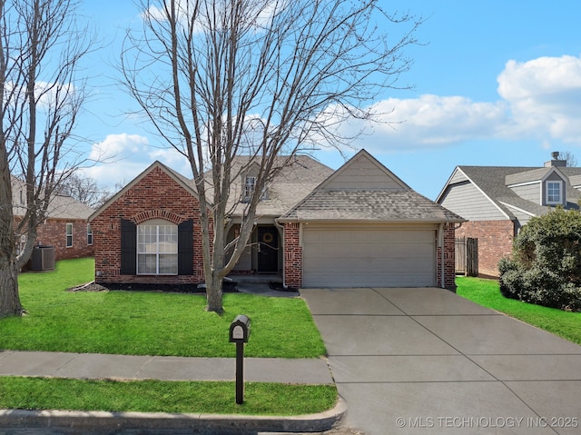 view of front of house featuring cooling unit, an attached garage, a front lawn, concrete driveway, and brick siding