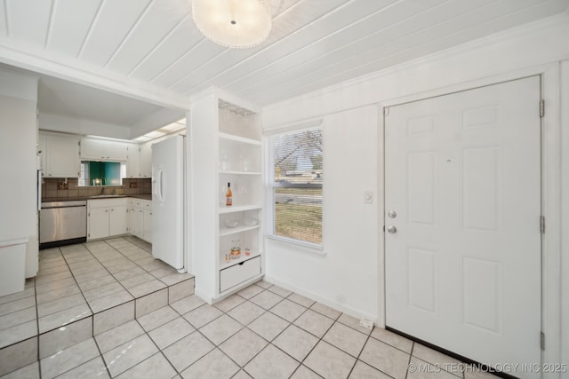 2503 S Pittsburg Ave, Tulsa, OK 74114 - entrance foyer with light tile patterned floors