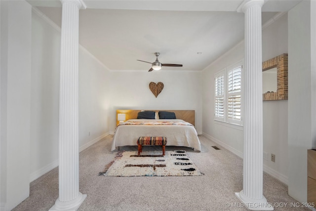 bedroom featuring carpet flooring, baseboards, and ornate columns