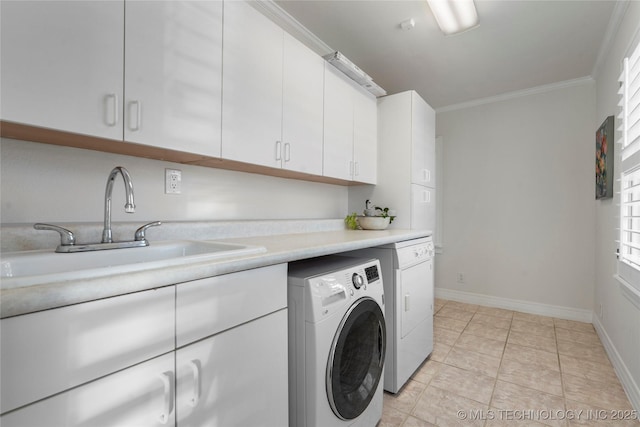 laundry room with baseboards, washer / clothes dryer, cabinet space, a sink, and ornamental molding