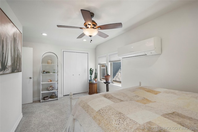 bedroom featuring baseboards, ceiling fan, carpet, a wall mounted air conditioner, and recessed lighting