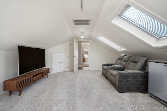 bonus room with lofted ceiling with skylight, carpet, visible vents, and baseboards