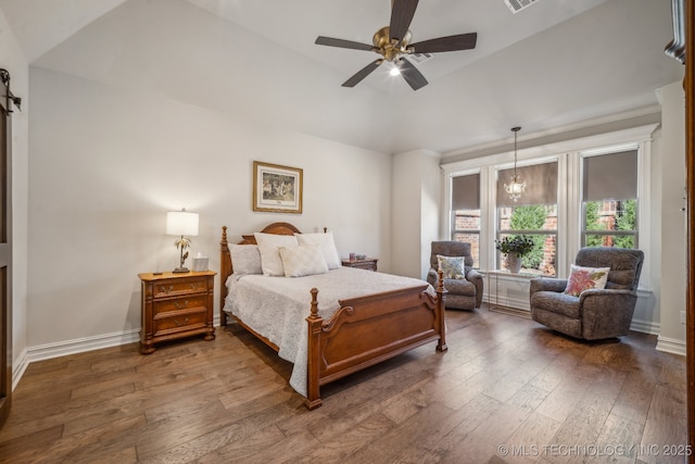 3828 W Orlando St, Broken Arrow, OK 74011 - bedroom with dark wood-style flooring, vaulted ceiling, baseboards, and ceiling fan