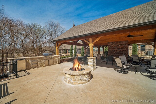 3828 W Orlando St, Broken Arrow, OK 74011 - view of patio / terrace with a fire pit, grilling area, an outdoor kitchen, a gazebo, and ceiling fan
